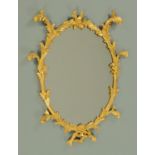 A Georgian carved giltwood framed mirror, in the rococo style.