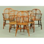 A matched set of five 19th century yew wood and elm Windsor chairs,