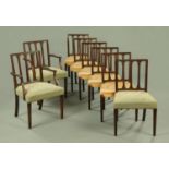 A set of eight George III style mahogany dining chairs, each with bowed top rail, three splat back,
