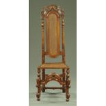 An antique walnut side chair,