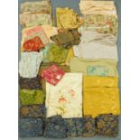 A large quantity of pieces of vintage fabric, various patterns and sizes.