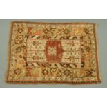 An Eastern rug, with centre rectangular panel with beige ground,
