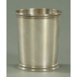 An American Sterling silver "Julep" cup, with beaded rim and base on a tapering body,