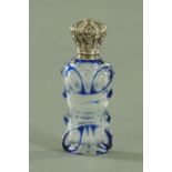 A Victorian blue overlay and clear cut scent bottle, with embossed silver coloured metal hinged top.