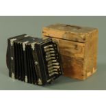 A Victorian Bijou melodeon, dated 1891, in original box.