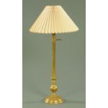A late 19th century brass adjustable table lamp,