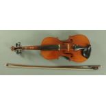 A full size students violin, 20th century, with two piece back, 59.5 cm overall, together with a 73.