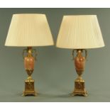 A pair of rouge marble and gilt metal mounted table lamps, 20th century,