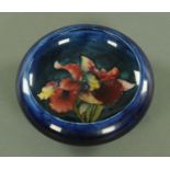 A Moorcroft orchid pattern bowl, early/mid 20th century, with inverted rim,