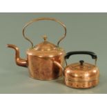 A Victorian copper kettle with loop handle, and another.