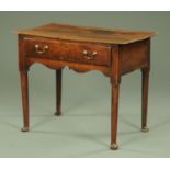 An early 19th century oak side table,
