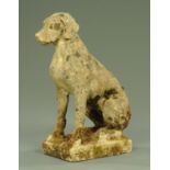 A composition stoneware garden ornament in the form of a seated hound. Height 70 cm.