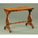 A Victorian walnut stretcher table, with well figured top,