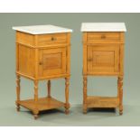 A pair of Edwardian oak bedside cabinets,