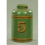 A 19th century green painted tea canister, with number 5. Height 39 cm.