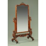 A Victorian cheval mirror,