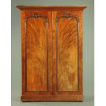 A Victorian mahogany two door wardrobe,