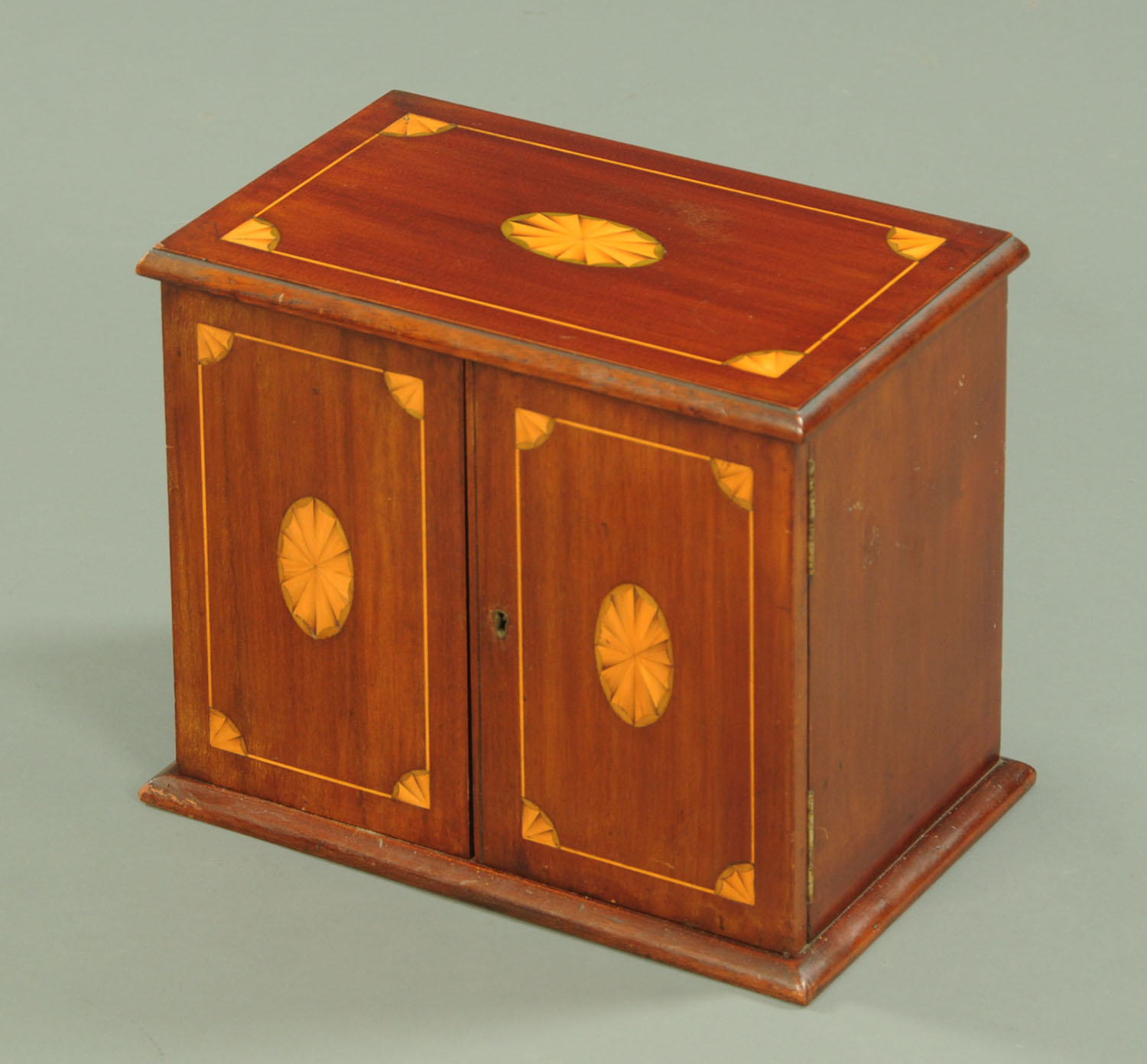 An Edwardian mahogany and inlaid tobacco chest,