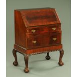 A mahogany fall front bureau, with well fitted interior,