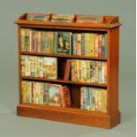 An oak open bookcase, late Victorian,