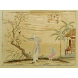 A Chinese silk embroidery, 18th/19th century, depicting a young boy and man,