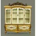 A large painted cupboard on chest,