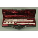 A Buffet "crampon" cooper scale plated flute, within a plush fitted buffet case.