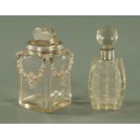 A cut glass scent bottle with silver mount,