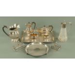 A four piece silver plated tea service, lemonade jug, rectangular tray, two toast racks,