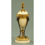 An early 19th century marble and gilt bronze casoulet,