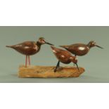A hand carved model of three birds, by Stewart Males, dated to the underside 1996,