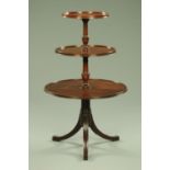 A George III mahogany three tier revolving dumbwaiter,