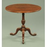 A George III oak tripod table,