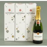 Four bottles of Tattinger champagne, three with outer boxes (see illustration).