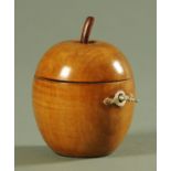 A turned fruitwood apple form tea caddy, in the Georgian style. Overall height 11 cm.