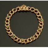 A ladies gold metal hollow link bracelet, set with green stones, the clasp struck "9 C",