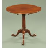 A George III mahogany snap top tripod table, with moulded lip,