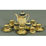 An Edwardian porcelain tea set, Crescent Brothers, 37 pieces, and an Art Deco coffee set.