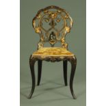 A Victorian papier mache chair, stamped Jennens and Bettridge, with upholstered seat,