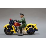 An American cast iron motorcycle patrol toy, possibly Hubley, having repainted body,