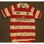 A signed Wigan Warriors rugby jersey