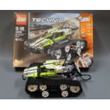 A boxed and assembled Lego Technic RC Tracked Racer (No.