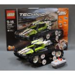 A boxed and assembled Lego Technic RC Tracked Racer (No.