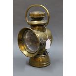 A brass Powell & Hanmer carbide lamp, marked "PH British Made 343" to the base,