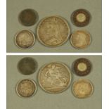 A George III shilling, 1819, a George IV farthing, 1822, a Victorian one penny model,