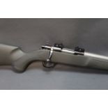 A Sako 223 Remington bolt action rifle, with a stainless steel bull barrel,