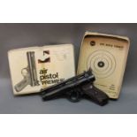 A Webley premier Cal 22 air pistol, circa 1964-1977 with brown grips, the action stamped E and 486,