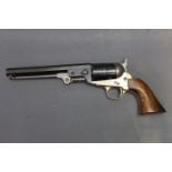 A heavy reproduction single action revolver, with brass trigger guard and strap,