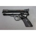 A Webley Tempest Cal 22 over lever air pistol, no visible serial number.