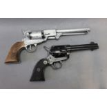 Two single action revolvers, the first black in colour stamped "Gun Toys SRL Made in Italy",